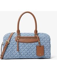 MICHAEL Michael Kors - Mk Jet Set Travel Medium Signature Logo Print Denim Duffel Crossbody Bag - Lyst