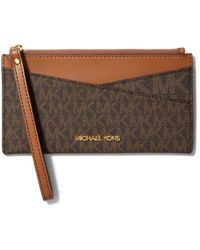 Bolsos de mano Michael Kors de mujer: hasta el 60 % de descuento | Lyst