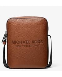 Michael Kors - Cooper Logo Embossed Pebbled Leather Flight Bag - Lyst