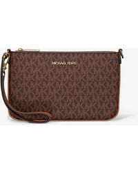 Michael Kors - Jet Set Small Signature Logo Convertible Wristlet - Lyst