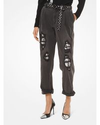 Michael Kors Jean carotte déchiré à sequins en denim extensible - Multicolore
