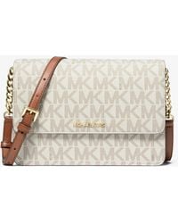 Michael Kors Outlet - Mk Daniela Large Signature Logo Crossbody Bag - Lyst