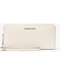 MICHAEL Michael Kors - Mk Jet Set Travel Large Pebbled Leather Continental Wallet - Lyst