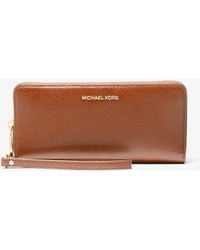 MICHAEL Michael Kors - Mk Jet Set Travel Large Pebbled Leather Continental Wallet - Lyst