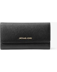 Michael Kors - Jet Set Travel Crossgrain Leather Tri-Fold Wallet - Lyst