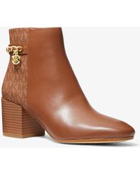Stivali Michael Kors da donna - Fino al 70% di sconto | Lyst