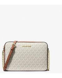 Michael Kors Outlet - Mk Jet Set Large Printed Logo Crossbody Bag - Lyst