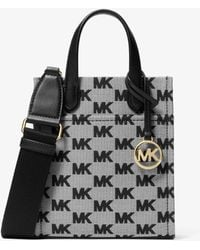 Michael Kors Outlet - Mk Gigi Extra-Small Logo Jacquard Crossbody Bag - Lyst