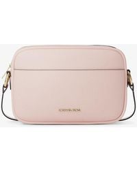 Michael Kors - Jet Set Large Pebbled Leather Camera Crossbody Bag - Lyst