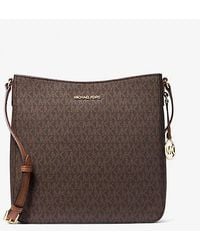 Michael Kors - Michael Signature Jet Set Large Travel Messenger ... - Lyst