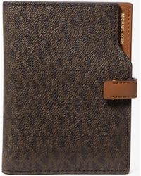 MICHAEL Michael Kors - Mk Jet Set Signature Logo Passport Wallet - Lyst