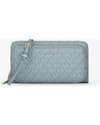 MICHAEL Michael Kors - Mk Jet Set Large Signature Logo Continental Crossbody Bag - Lyst