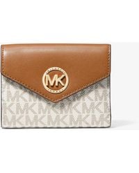 MICHAEL Michael Kors - Mk Carmen Medium Logo And Leather Tri-Fold Envelope Wallet - Lyst