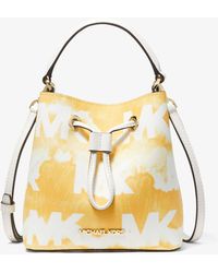 suri small python embossed crossbody bolsa