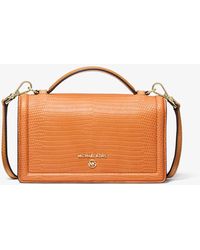 Jet Set Small Lizard Embossed Leather Smartphone Crossbody Bag 2024 www.alhudapk
