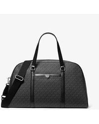 Michael Kors - Jet Set Travel Extra-Large Signature Logo Weekender Bag - Lyst