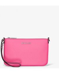 Michael Kors - Jet Set Small Pebbled Leather Convertible Wristlet - Lyst