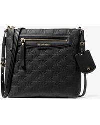 MICHAEL Michael Kors - Mk Jet Set Travel Large Logo Embossed Leather Crossbody Bag - Lyst