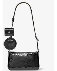 Michael Kors - Jet Set Small Patent Logo Debossed Crossbody Bag With Case For Apple Airpods Pro - Lyst