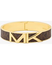 Michael Kors Pulsera rígida Mott dorada con logotipo - Marrón
