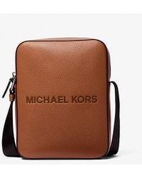 Michael Kors - Cooper Logo Embossed Pebbled Leather Messenger Bag - Lyst