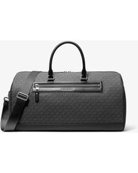 Michael Kors - Jet Set Signature Logo Weekender Bag - Lyst