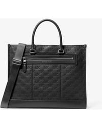 Michael Kors - Mk Jet Set Logo Embossed Leather Tote Bag - Lyst