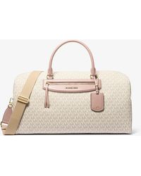 MICHAEL Michael Kors - Mk Jet Set Travel Extra-Large Signature Logo Weekender Bag - Lyst