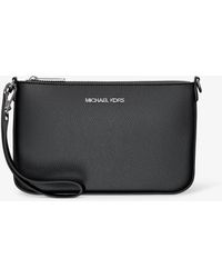 Michael Kors - Jet Set Small Pebbled Leather Convertible Wristlet - Lyst