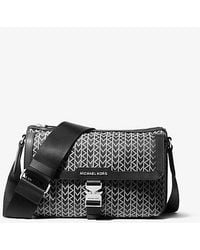 ショルダーバッグ Michael Kors AVIATOR FLAP MESSENGER W POUCH Michael Kors Aviator Flap Messenger W Pouch Bags in Black