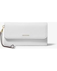 MICHAEL Michael Kors - Mk Jet Set Medium Pebbled Leather Smartphone Wristlet - Lyst