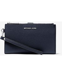 MICHAEL Michael Kors - Portafoglio per smartphone Adele in pelle martellata - Lyst