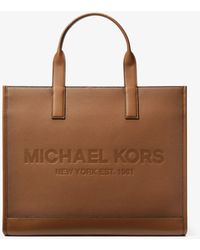 Michael Kors Cooper Logo Embossed Faux Pebbled Leather Tote Bag - Brown