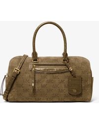 MICHAEL Michael Kors - Michael Kors Jet Set Travel Medium Logo Embossed Suede Duffel Crossbody Bag - Lyst