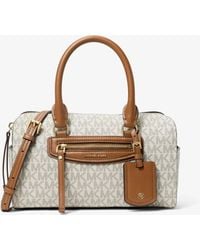 MICHAEL Michael Kors - Mk Jet Set Travel Extra-Small Signature Logo Duffel Crossbody Bag - Lyst