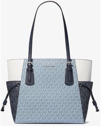 Michael Kors Outlet - Mk Grand Cabas Voyager À Couleurs Contrastées Et À Logo Signature - Lyst