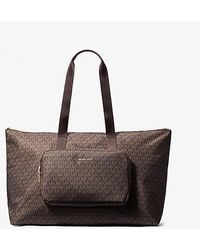 Michael Kors - Tanner Large Logo Reversible Packable Tote Bag - Lyst