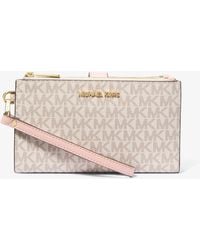 Michael Kors - Jet Set Travel Signature Logo Smartphone Wallet - Lyst
