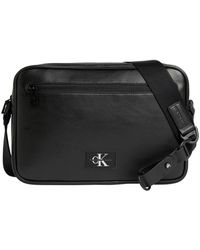 Calvin Klein - Borsa a tracolla nera per fotocamera - Lyst