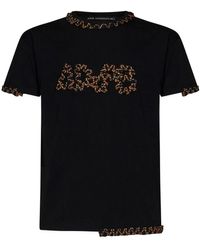 ANDERSSON BELL - Schwarzes baumwoll-t-shirt mit gesticktem logo - Lyst