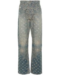 Amiri - Jeans in denim stonewashed con motivo bandana - Lyst