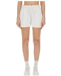 Stella McCartney - Logo Patch Shorts - Lyst