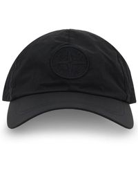 Stone Island - Cappelli neri con coulisse e visiera curva - Lyst