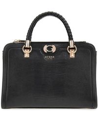 Guess - Handbags - Lyst