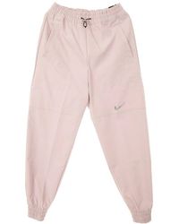 Nike - Hohe Taille Gewebte Lange Hose - Lyst