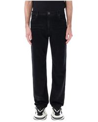 Balmain - Jeans in denim nero con dettaglio taglio western - Lyst