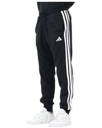 adidas - Fitness ,Zwart ,Zwarte Sportieve Essential 3-Stripes Broek - Lyst