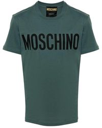Moschino - T-shirt e polo verde con stampa logo - Lyst