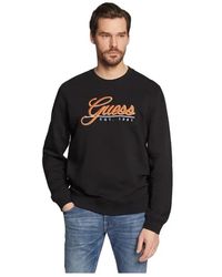 Guess - Hoodies & Sweatvesten ,Zwart ,Stijlvolle Sweatshirt - Lyst
