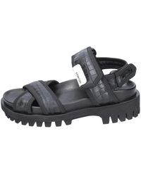 Stokton - Flat Sandals - Lyst